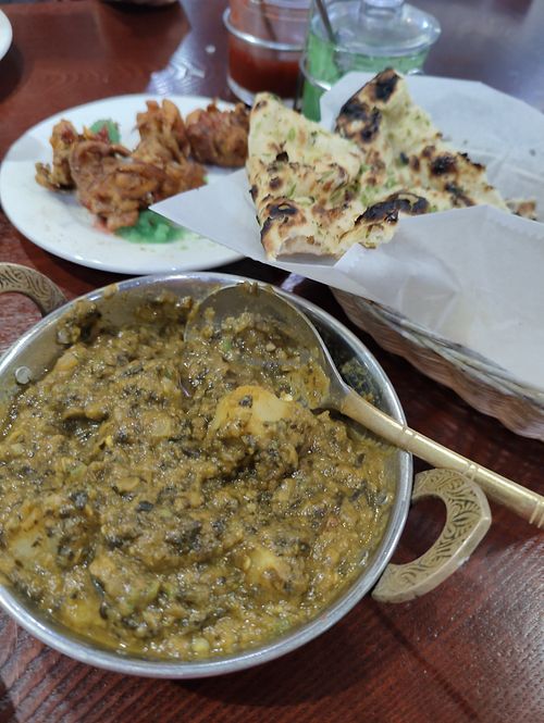 Aloo palak, pakora, and green chili naan :) at India Restaurant La Habra in La Habra