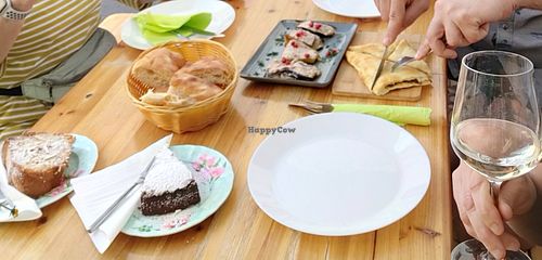 Apple cake, chocolate cake, aubergine rolls, flatbread with mushrooms and peppers at Maspinzelo in Cologne