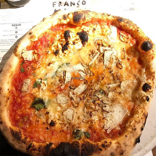 Vegan-friendly pizza with mushrooms .  at Franco Manca - Stoke Newington in North London
