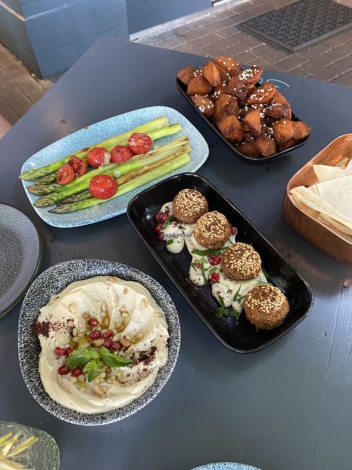 Hummus, grilled asparagus, potatoes with harissa (already marinated, not separate as last time), falafel  at Das Peace in Hamburg