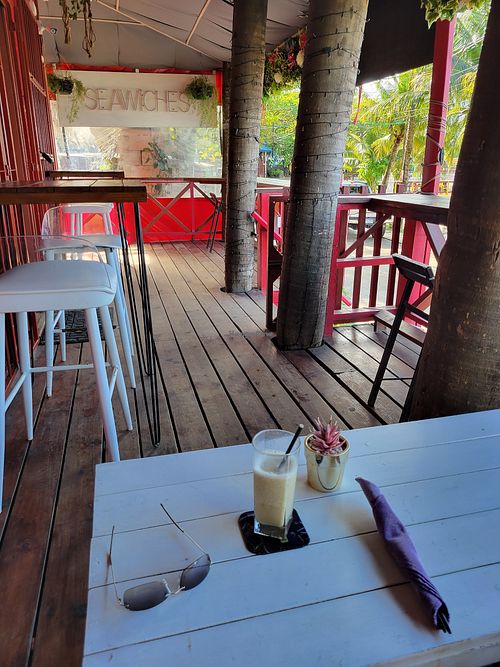 Patio seating at Seawiches Lounge Bar in Roatan