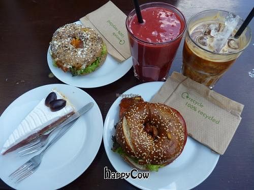 Berry bang smoothie, iced latte with almond milk, BBQ tempeh bagel, salami bagel, rhubarb grape pie at Goodies Berlin - Schivelbeiner Strasse 34 in Berlin