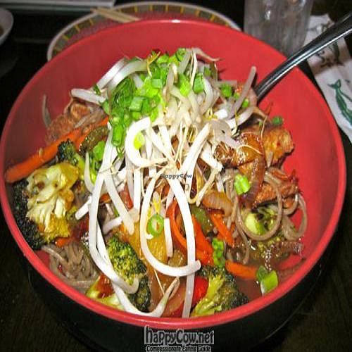Mock Chicken Szechuan with Crispy chicken stir fried with carrots, onions, broccoli, peppers and pineapple tossed in a spicy Szechuan sauce over rice. at Sticky Rice in Baltimore