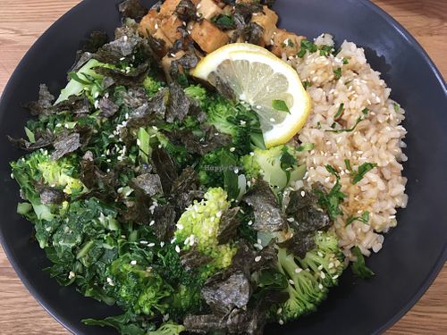 Bowl with rice, marinated tempeh and vegetable at Paladares Vegan in Braga