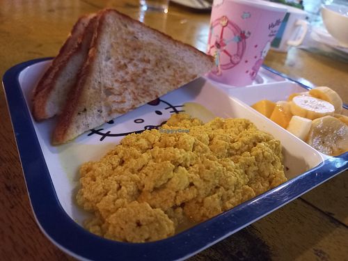 Kids scrambled 'egg' (tofu) on toast with fruit and juice at Ozark by Food4Thought in Chiang Mai