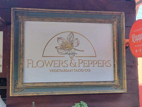 The sign at flowers & peppers in Tijuana