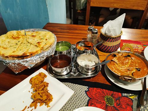 Garlic Naan and Aloo Baigan (potatoe, eggplant) at Harbour Kitchen in Zanzibar