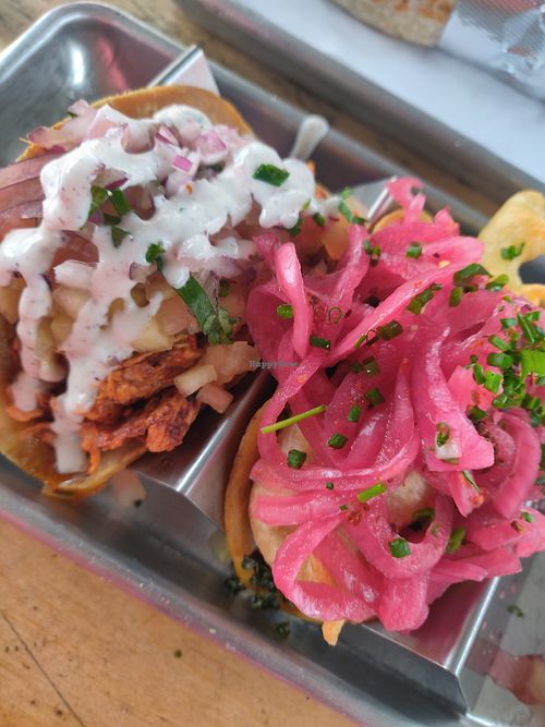Spicy jackfruit carnitas with watermelon and the fried squash blossom with vegan Chihuahua cheese at Tacos Tu Madre - Westwood in Los Angeles