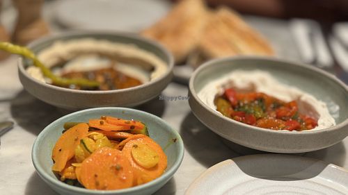 Mildred's sampler first course. Pickled Vegetables, vegetables taktouka whipped mascarpone, salsa macha hummus  at Mildreds - Covent Garden in London