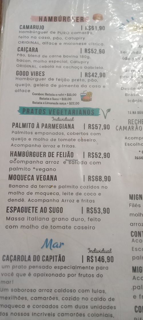 Seção de pratos vegetarianos/veganos no cardápio [foto de maio/2026] at Caramujo in Paraty
