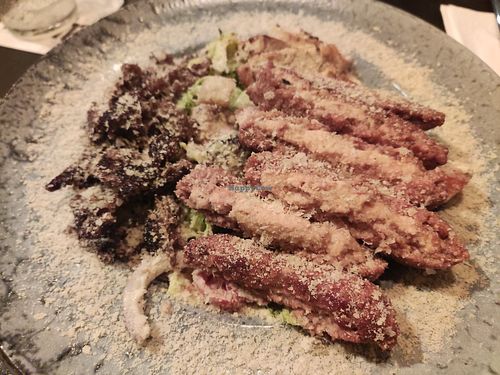 Caesar salad with redefine meat and la-feta burger at Alpaca Bar in Tel Aviv