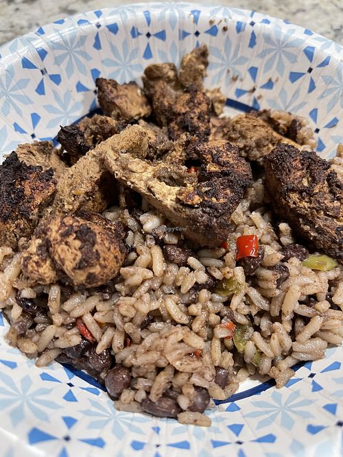 Jerk chicken (legit jerk flavor!) and rice and peas. Delicious !  at Atlas Monroe in San Diego