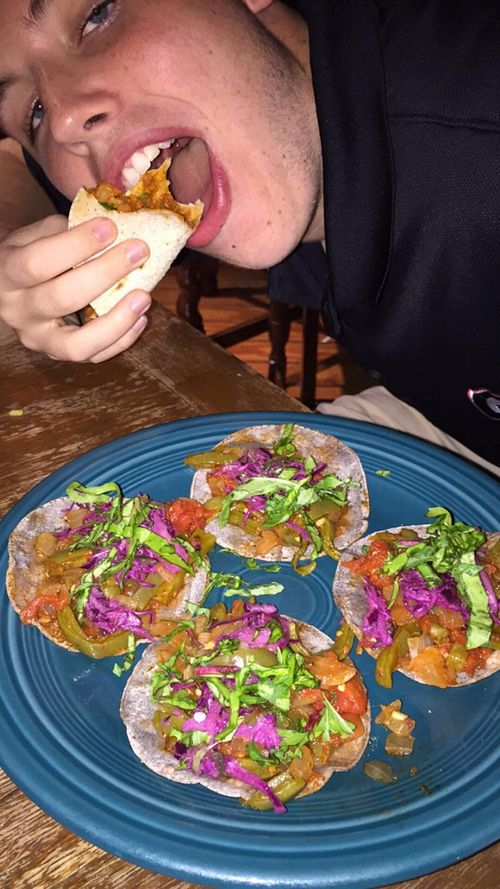 Jake enjoying the napoles tacos! at Vegeria - Viva Book Complex in San Antonio