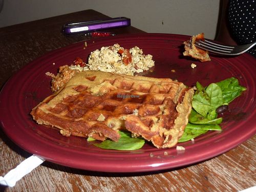 Cinnamon raisin waffles, sun dried tomato basil tofu, spinach tomato salad, black beans at Vegeria - Viva Book Complex in San Antonio