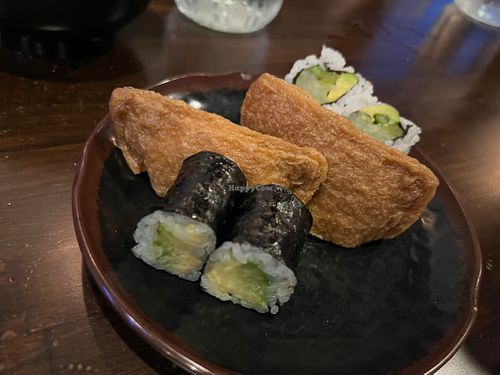 Teeny sushi bites and sad, dry, skinny inari 😕 at Umi Sushi in Green Bay