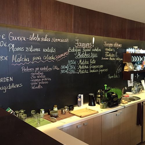 menu board and wheat grass press at The Beginnings - Skolas in Riga