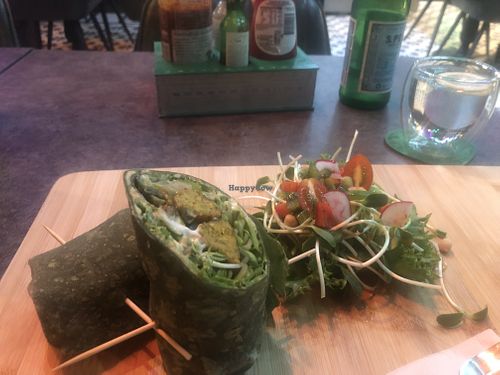 Falafel wrap with side salad  at The Vegan Table in Bangkok