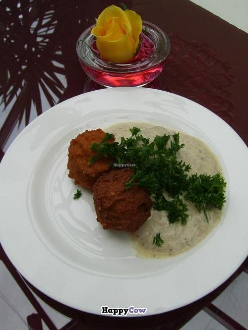 Spicy potato pakoras in a soothing yogurt and parsley sauce. Yum! at Govinda's Restaurant in Septon