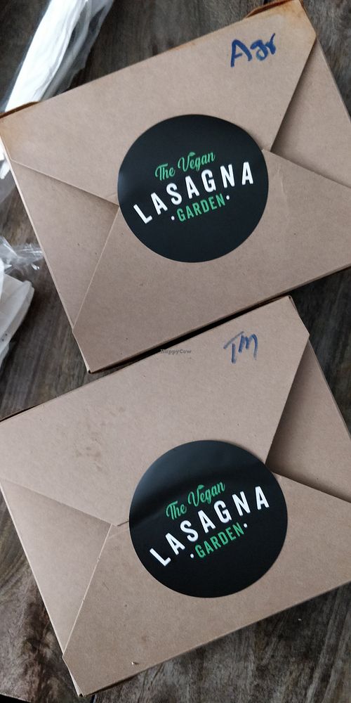 Take out boxes (pop out the corners to make it lay flat like a plate) at The Vegan Lasagna Garden - Cloud Kitchen in Milpitas