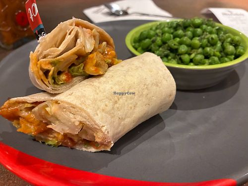 The Great Imitator Wrap with side of Macho Peas at Nando's in West London
