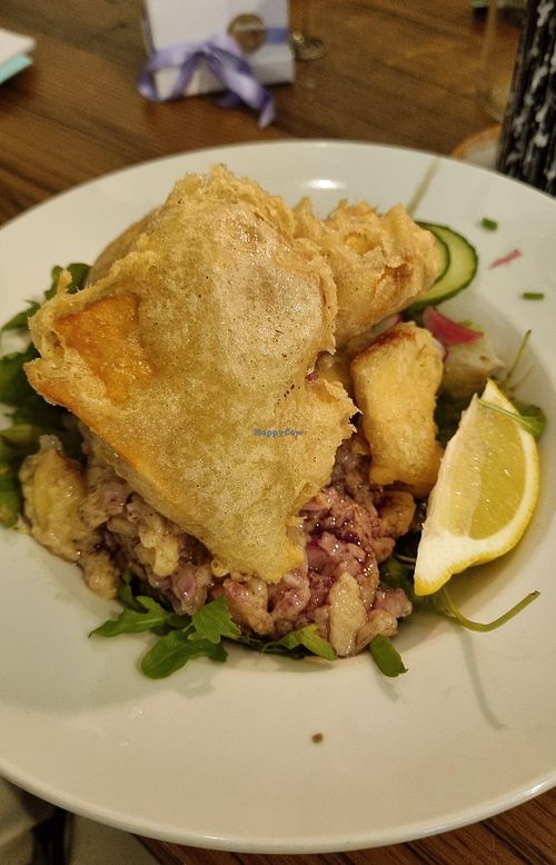 Steirischer Backhendlsalat (dressing a bit oily) at Tisch in Vienna