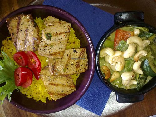 Chili con tofu y coco. Grilled chili marinated tofu, coconut spinach sauce, roasted nuts and Annato rice. at Maya Bar and Grill in Helsinki