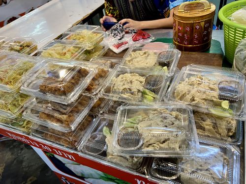 Meal boxes  at Boonniyom Santi Asoke Market ตลาดบุญนิยมสันติอโศก in Bangkok