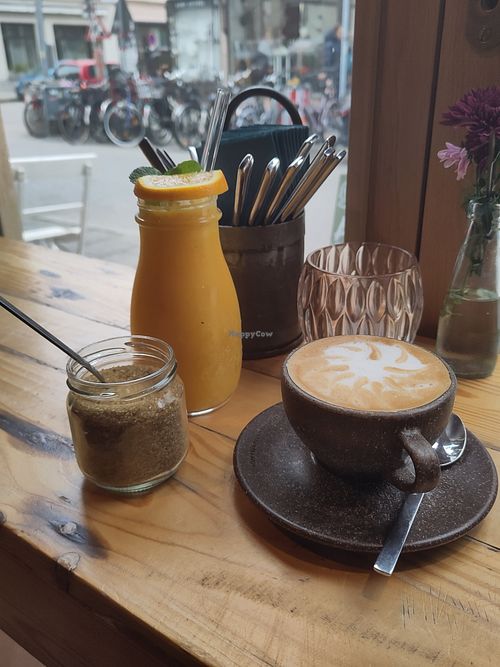 Oat flat white and orange ginger smoothie at togather in Munich