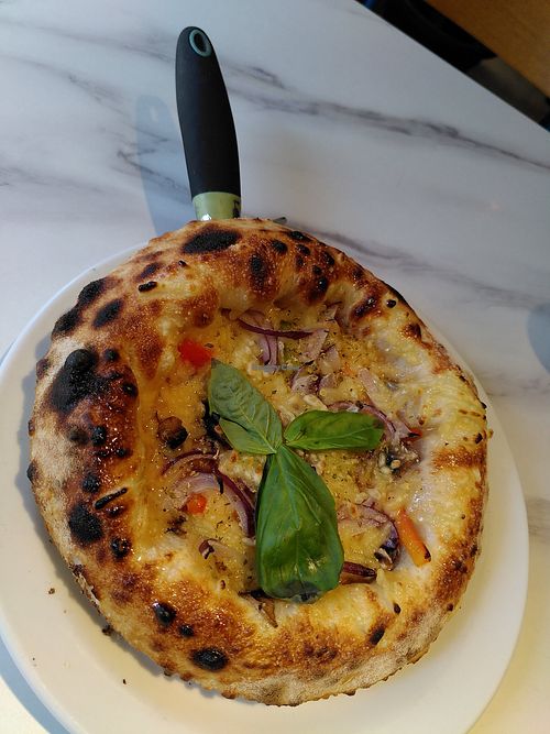 Vegan vegetarian deep dish pizza at Dough What in Leicester