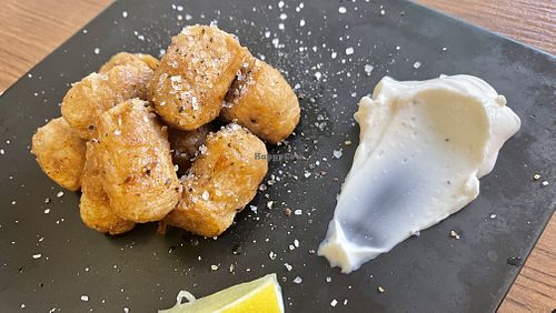 “Chicken” made of bean curd I believe.  Never had anything like it.    at Cofu in Vancouver