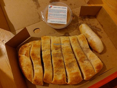 Cinnamon bread with caramel sauce at Domino's Pizza in Mannheim