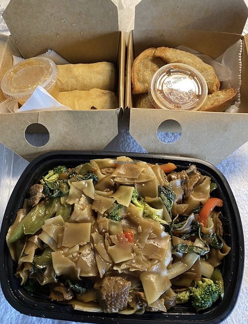 Drunken Noodles, Thai egg rolls, curry puffs  at Coconut Thai in Edina
