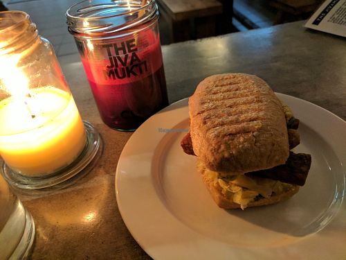 "The Local" sandwich with a half glass of the Pink Power juice at Jivamukti Canteen in Berlin