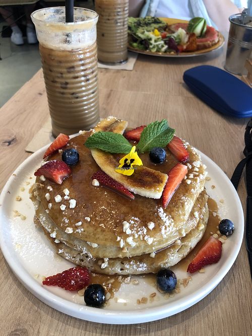 Vegan pancakes and oat milk iced latte  at Brunchit  in Mallorca