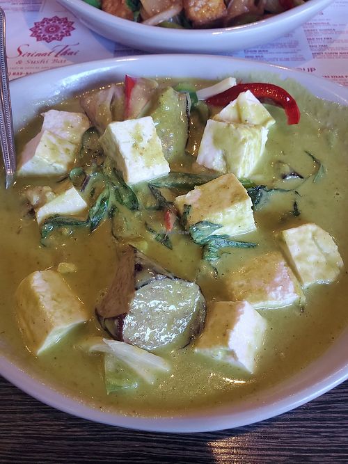 Green curry with fresh tofu, thai eggplant, thai basil, bell pepper. medium spicy at Sirinat Thai in San Pedro