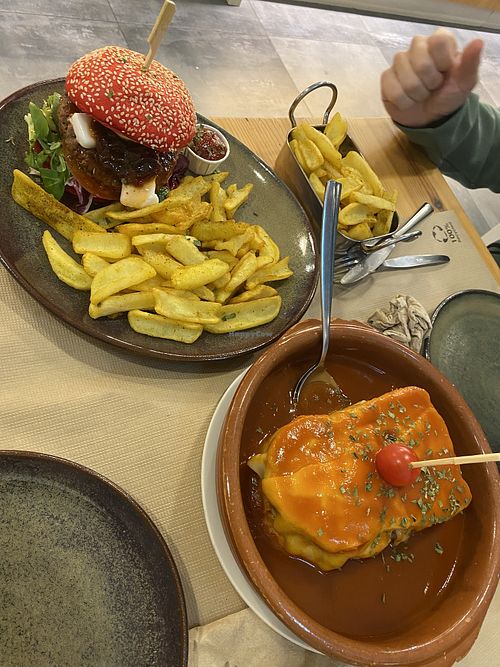 We had the burguês burger and francesinha. The bread on both was just amazing and a staple of the meals.   at Guará in Vila Nova De Gaia
