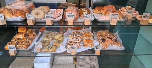 Many marked vegan sweet items at French Monkey in Glasgow