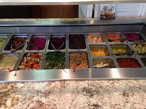 Oooo toppings!! at vfalafel in Washington