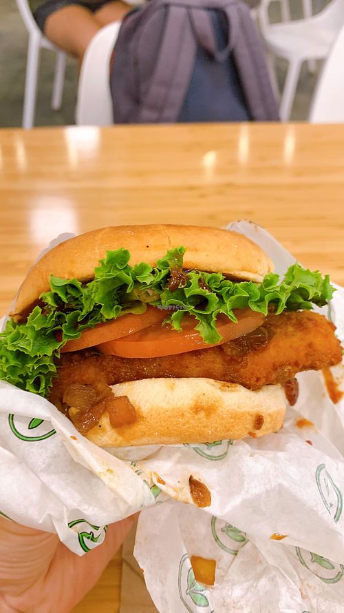 chickn burger with extra onions and avocado  at Plant Power Fast Food in Hollywood
