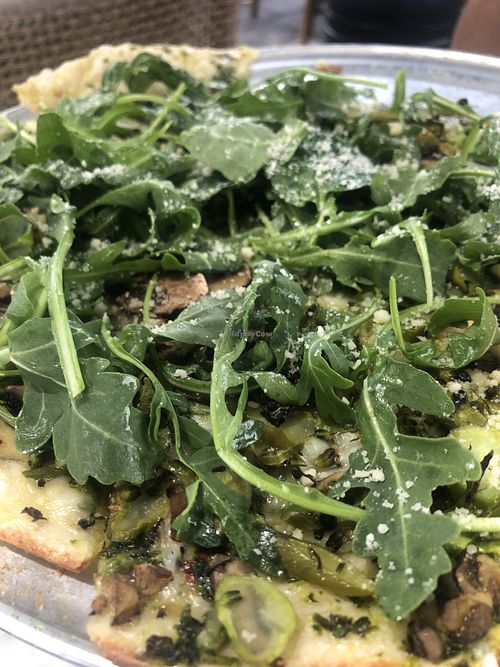 Flat bread with arugula, mushrooms, vegan cheeses and chimichurri  at Wildseed  in Palo Alto