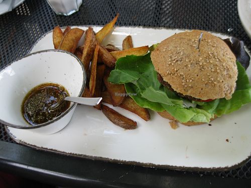 Chimichurri burger (Chimichurri is apparently an Argentinian inspired spicy dip made of mint, parsley, chilies, garlic, ...) with extra potato wedges at Rosinante in Brunnthal