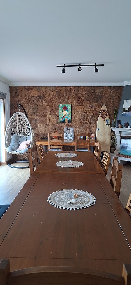 Common room (dinner table) at Surf Yoga Portugal in Ericeira