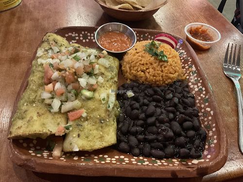 vegan enchiladas (sweet potato and kale filling) + black beans and rice + spicy sauce + chips  at El Halal Amigos in San Jose