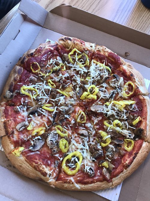 Large plant based supreme pizza   at Cottage Inn Pizza in Bay City