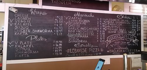 Menu items marked with a "V" are vegan. at The Lebanese Oven in Ventura