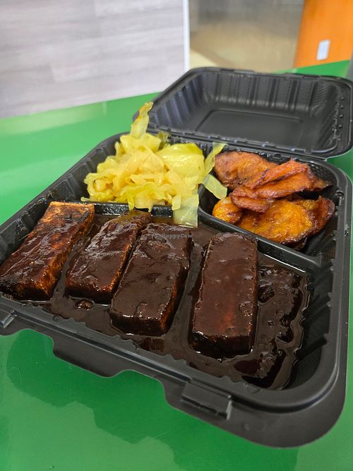 Mango Pineapple Jerk Tofu with plantains and cabbage 💯 at Palm Tree Caribbean Cafe in Hampton