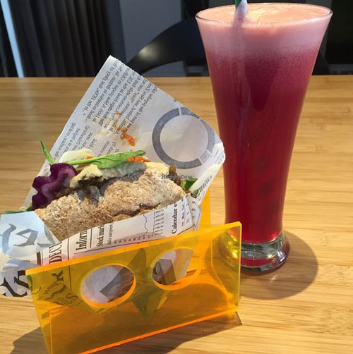 hummus sandwich and apple, pineapple, red cabbage juice at Botaniq in Copenhagen