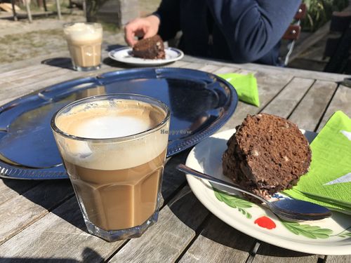 Oat milk cappuccino and vegan chocolate nut cake   at Wildmut in Bad Belzig