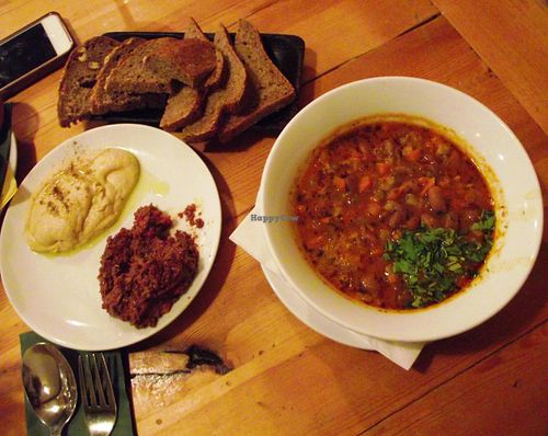 Freshly baked bread with hummus,olive paste and beans soup at Sunmoon - Alabin in Sofia