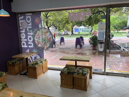 pointing outside   at Natural Blends Norte in Cali